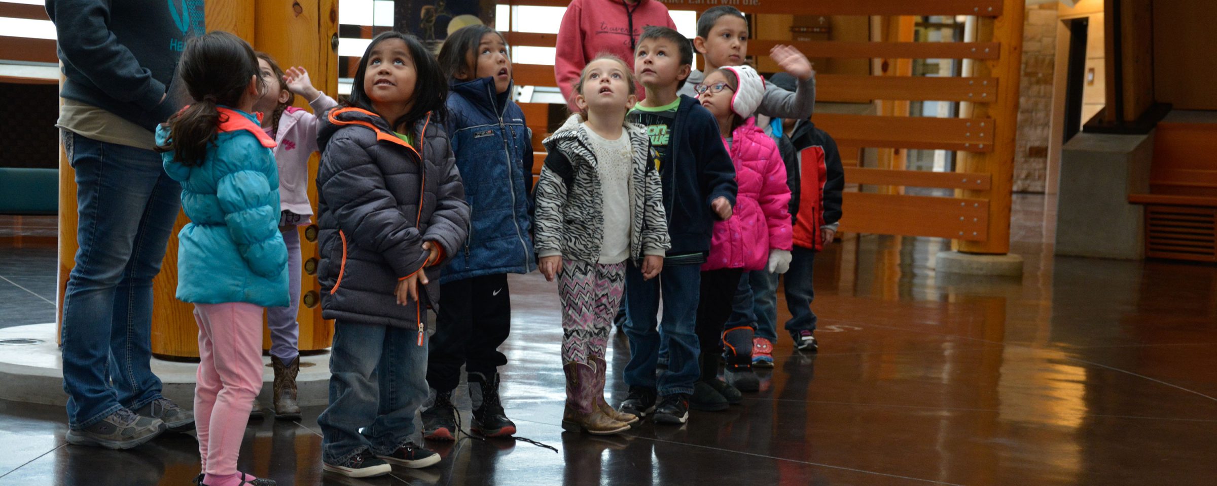 image of headstart kids looking up in museum